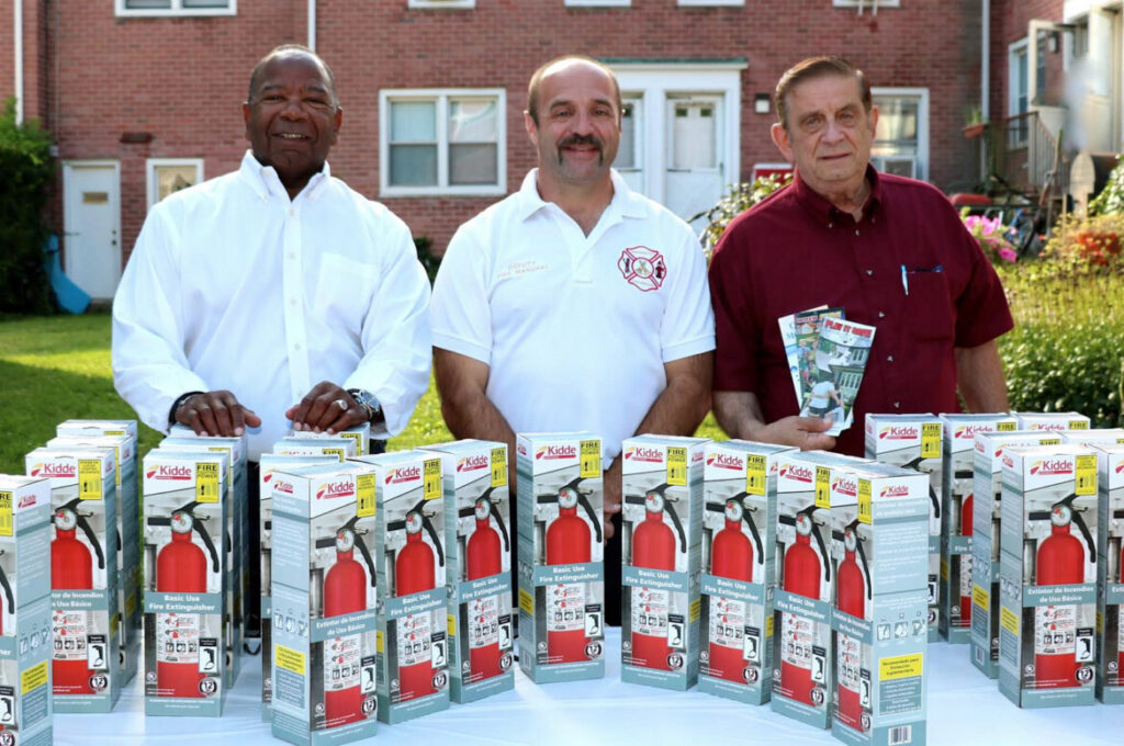 Fire Extinguishers handed out to Adams Garden's Residents